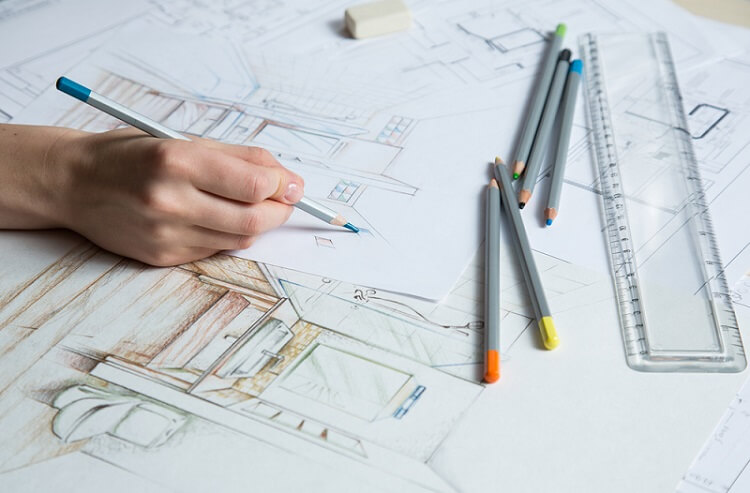 an interior designer drawing a sketch