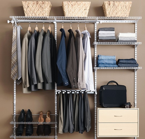 an open closed clothing storage space with shelves and hangers