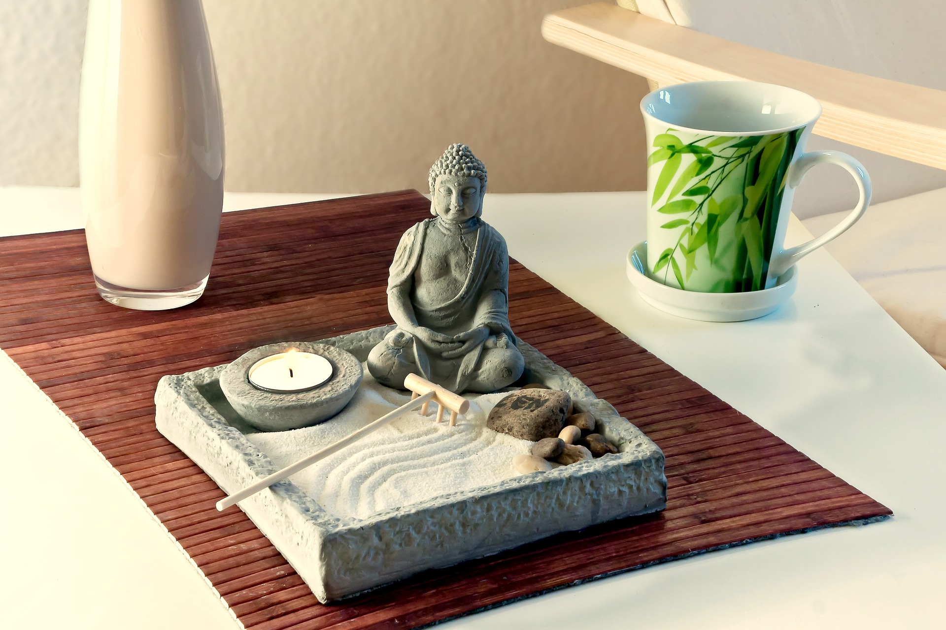 Buddha statue with tea candle